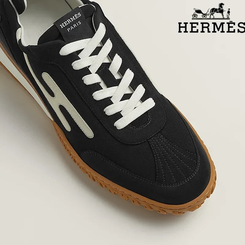 Herm¨¨s Black and White Bouncing Sneakers