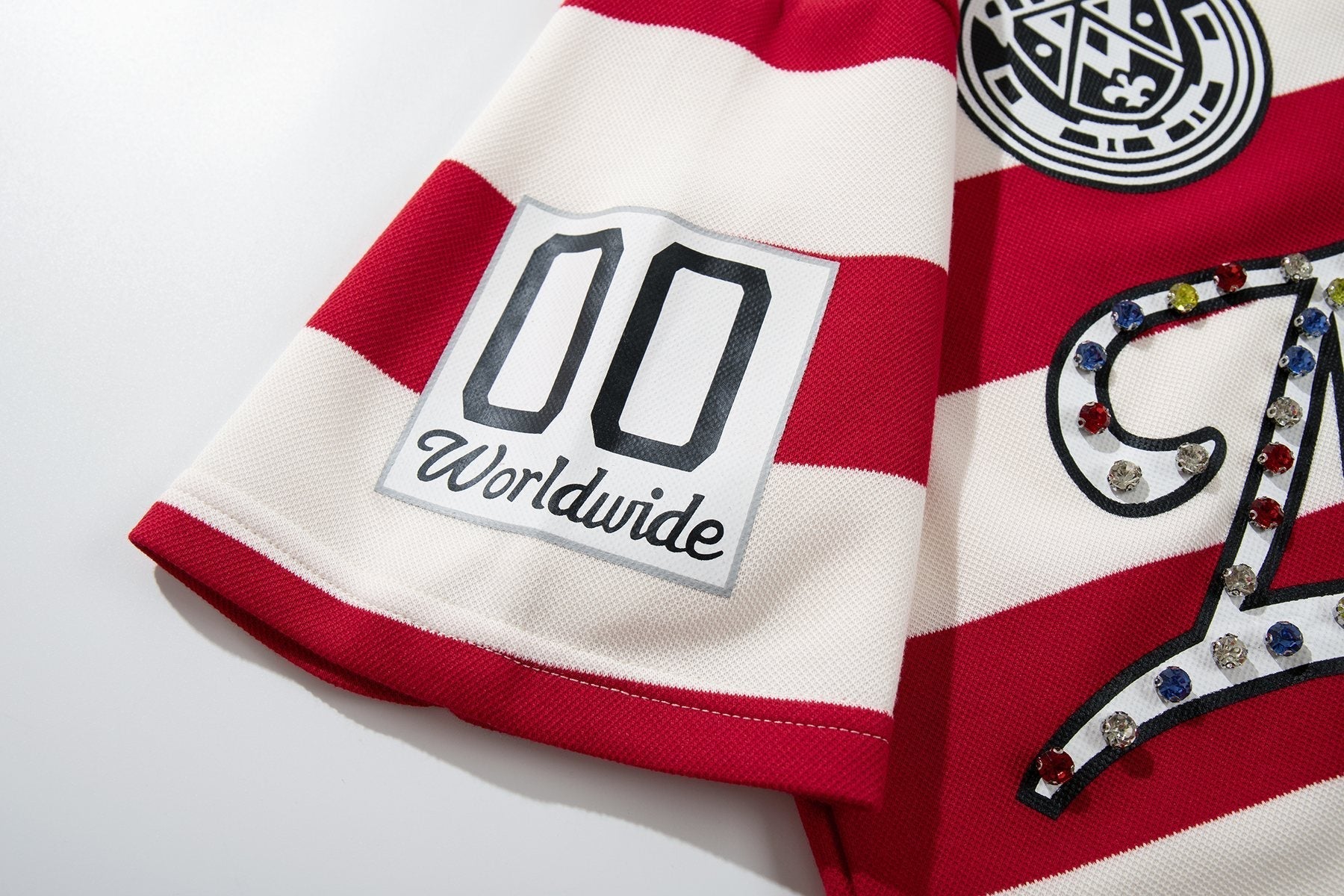 MAJESTIK Striped Crest Graphic Polo Shirt ¡ª detail